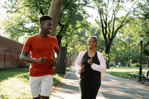Older woman running and smiling